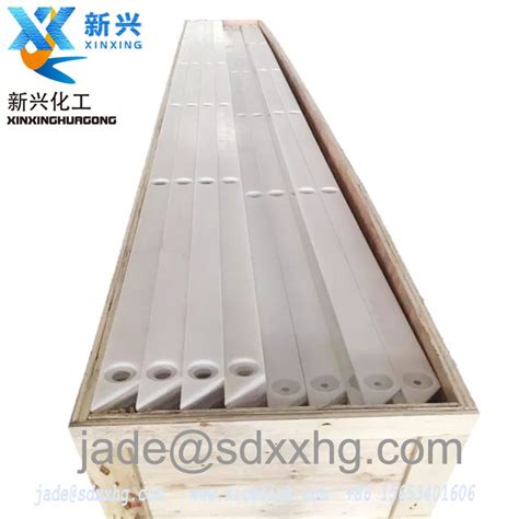 screw conveyor wear strips direct material flow|conveyor wear bands.